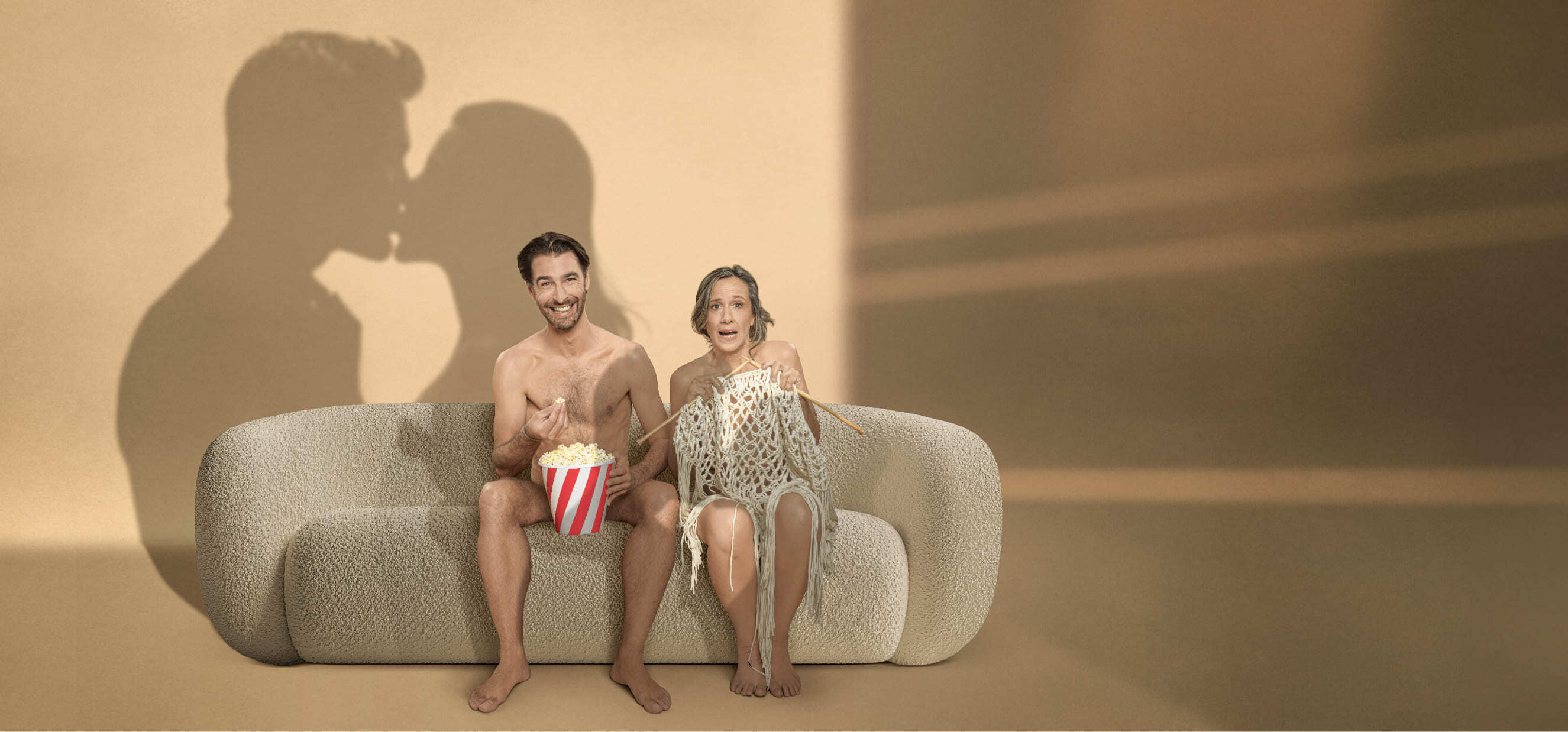 Dos personas divirtiendose en el cine de Qapital